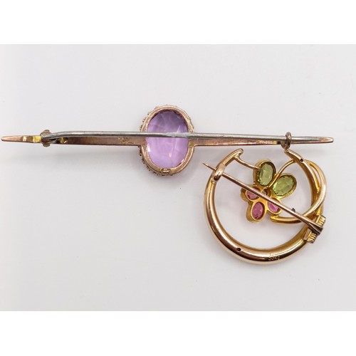 661 - A 9ct gold and amethyst bar brooch, and a yellow metal, tourmaline, peridot and seed pearl brooch (2... 