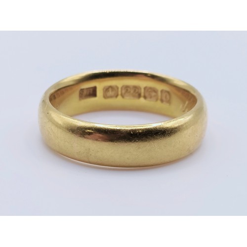 662 - A 22ct wedding band, 7.1 g, ring size K