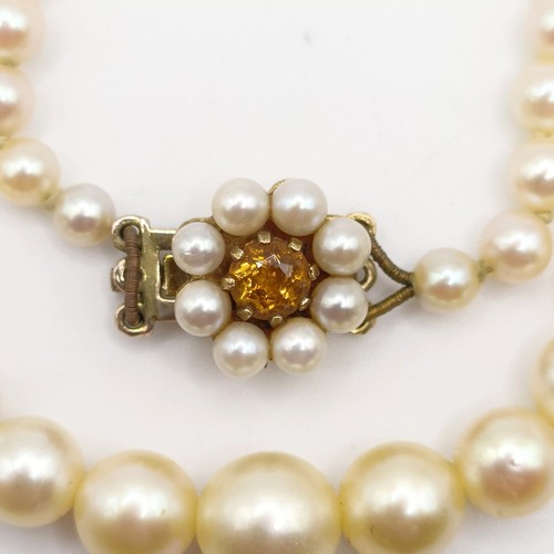 668 - A cultured pearl necklace, with a 9ct gold clasp
