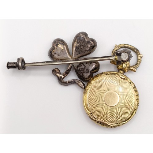 671 - A yellow metal pendent, testing as 9ct, 7.9 g and a bar brooch (2)