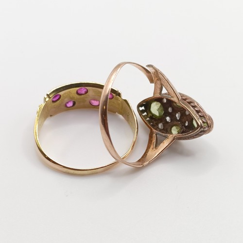 683 - A 15ct gold, garnet and seed pearl ring, and another ring (2)
