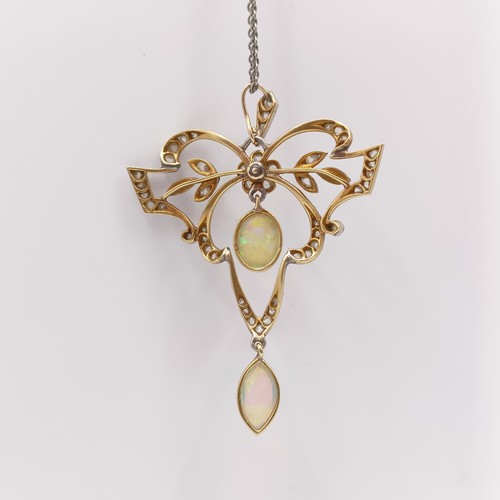 688 - An early 20th century opal and diamond pendant, on a later silver chain