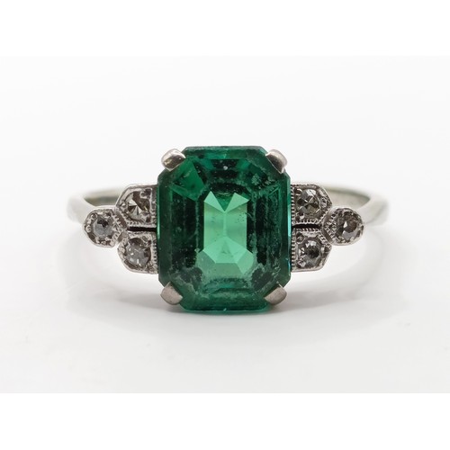 699 - An Art Deco 18ct gold, platinum, synthetic emerald and diamond ring, ring size O