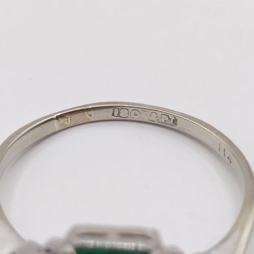 699 - An Art Deco 18ct gold, platinum, synthetic emerald and diamond ring, ring size O