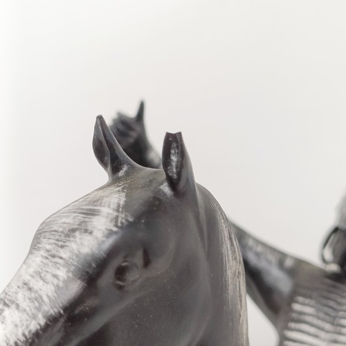 241 - A Beswick group of a Native American warrior on a rearing horse, matt, 24 cm high