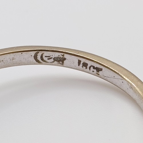 696 - A 18ct white gold and diamond flowerhead ring, ring size O