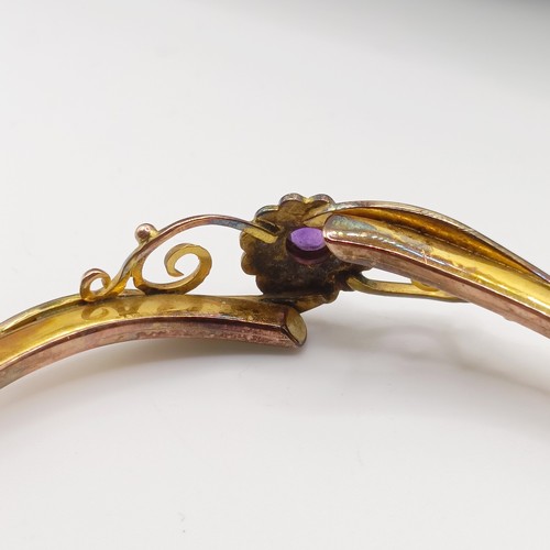 697 - A 9ct gold, amethyst and seed pearl bangle, 7.2 g all in, 7 cm wide, boxed