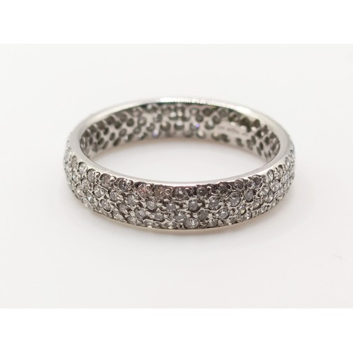 674 - A platinum and pave set diamond wedding band, ring size J