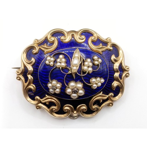687 - A Victorian yellow coloured metal, blue enamel and seed pearl memorial brooch, 6 cm wide, inset with... 