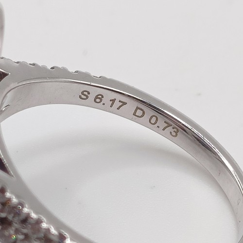 676 - An 18ct white gold, diamond and sapphire oval cluster ring, ring size M, sapphire 6.1ct approx., dia... 