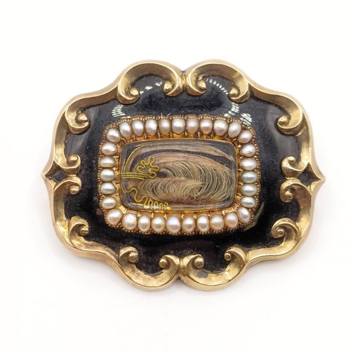 703 - A 19th century yellow coloured metal, cultured pearl and jet mourning brooch, inset with a lock of h... 