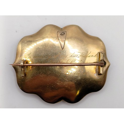 703 - A 19th century yellow coloured metal, cultured pearl and jet mourning brooch, inset with a lock of h... 