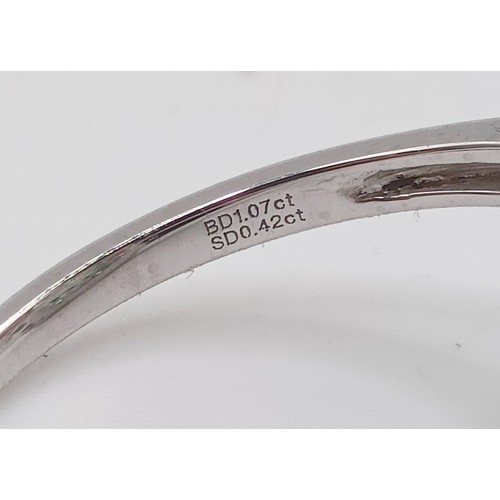 686 - An Art Deco style diamond and emerald target ring, central diamond 1ct approx., ring size N