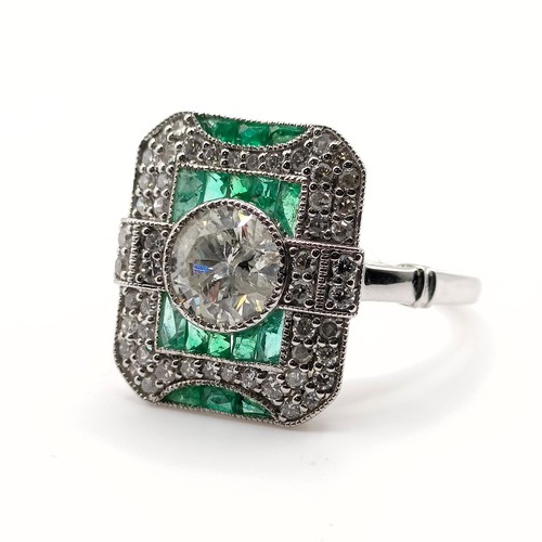 686 - An Art Deco style diamond and emerald target ring, central diamond 1ct approx., ring size N