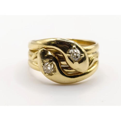 698 - An 18ct gold and diamond double snake ring, ring size T