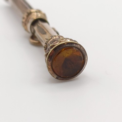 705 - A heart shaped locket, two pendants, a gilt metal pencil, and assorted costume jewellery