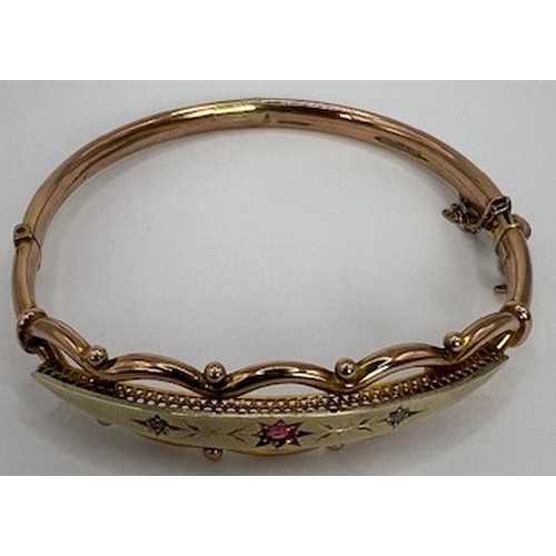 706 - A 9ct gold, sapphire and diamond bangle, 9.3 g, 7 cm diameter