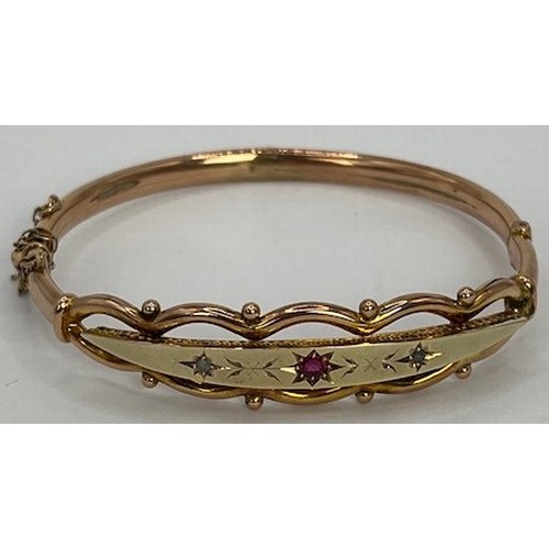 706 - A 9ct gold, sapphire and diamond bangle, 9.3 g, 7 cm diameter