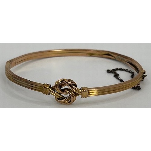 707 - A 10ct gold bangle, 6.5 g, 7 cm diameter