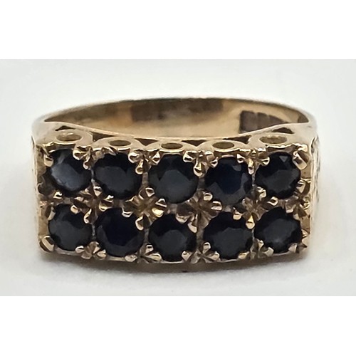 709 - A 9ct gold and sapphire ring, ring size N