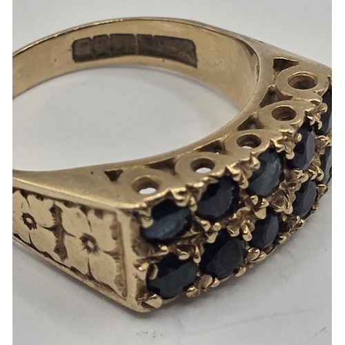 709 - A 9ct gold and sapphire ring, ring size N