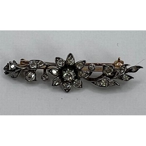 803 - An early 20th century diamond floral bar brooch, 43 mm wide, boxed
