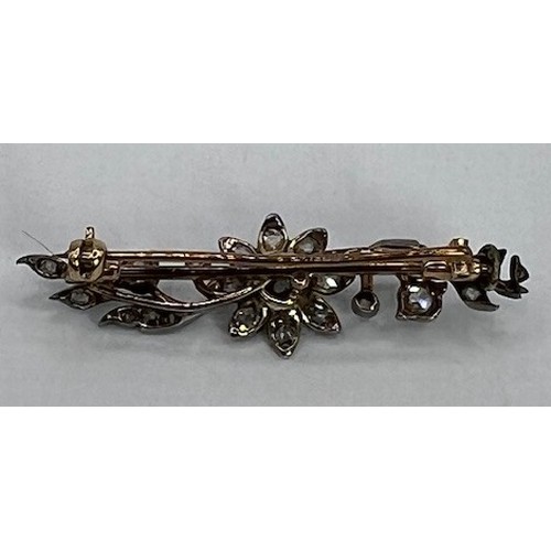 803 - An early 20th century diamond floral bar brooch, 43 mm wide, boxed