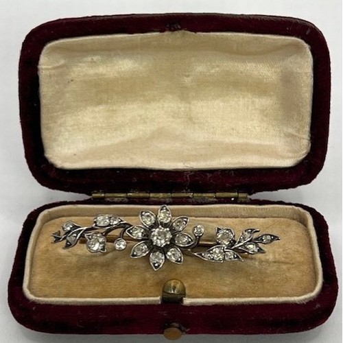 803 - An early 20th century diamond floral bar brooch, 43 mm wide, boxed