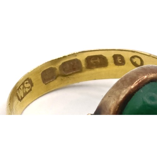 822 - A Victorian 22ct gold and cabochon cut jade ring, ring size N