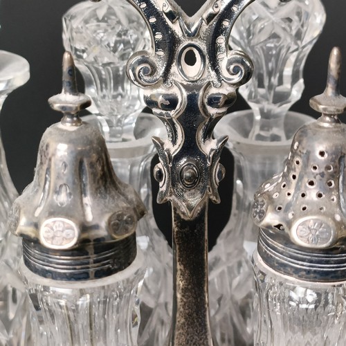 23 - A Victorian silver and cut glass eight piece cruet stand, London 1860, stand 28.5 ozt