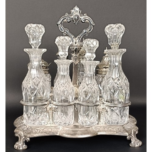 23 - A Victorian silver and cut glass eight piece cruet stand, London 1860, stand 28.5 ozt