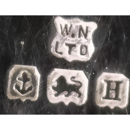 29 - A George V silver five piece Art Deco cruet, comprising two pepper pots, two triangular salts, and a... 