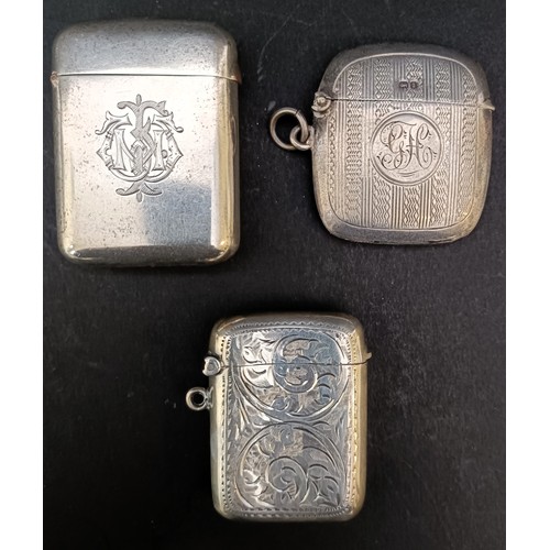 60 - A George V silver vesta, London 1922, and two other vestas, 2.9 ozt (3)