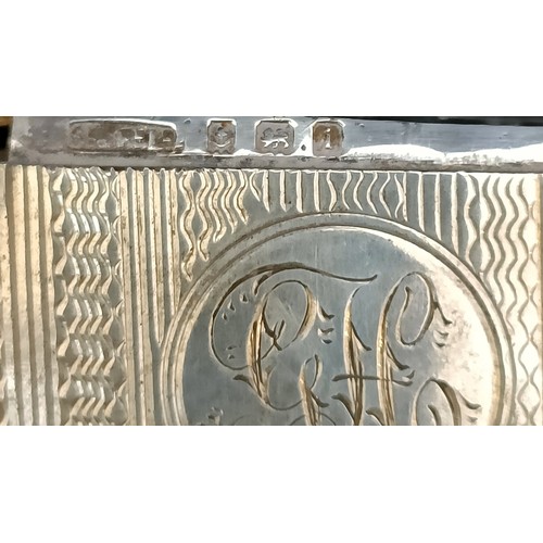 60 - A George V silver vesta, London 1922, and two other vestas, 2.9 ozt (3)