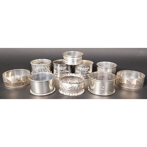 110 - Five silver napkin rings, a pair of Chinese silver coloured metal napkin rings, 3.8 ozt, and three s... 