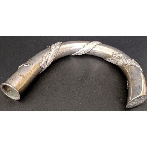 3 - A late 19th/early 20th century Chinese silver coloured metal walking stick handle, decorated a drago... 