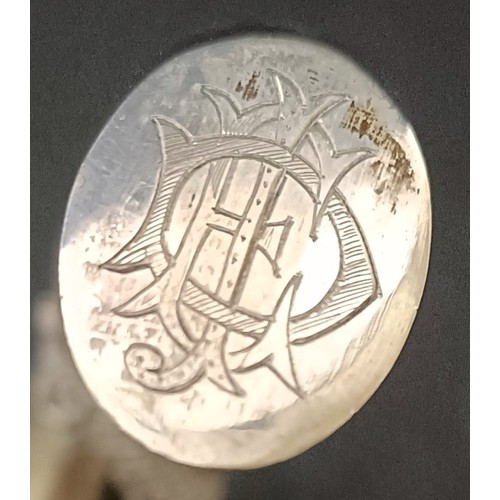 3 - A late 19th/early 20th century Chinese silver coloured metal walking stick handle, decorated a drago... 