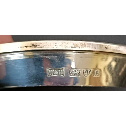 7 - A George V silver cream jug, 12 cm wide, and a pair of silver pin dishes, 4.3 ozt (3)