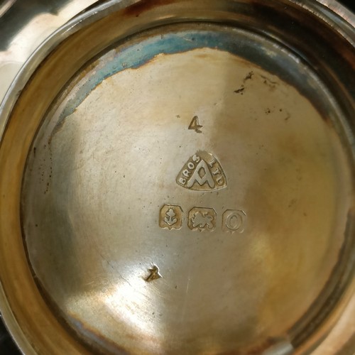 14 - A George VI silver three piece cruet, with blue glass liners, 2.7 ozt, cased