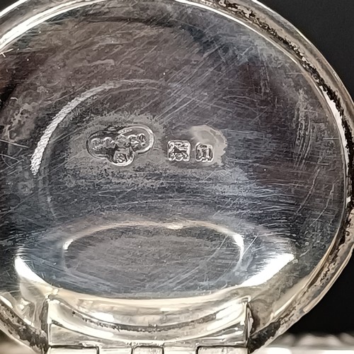 21 - An Edward VII silver desk stand, London 1908, 4.7 ozt, and a matching glass inkwell with a silver mo... 