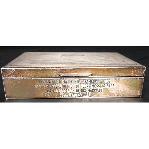 22 - A George V silver cigarette box, Birmingham 1924, 14 cm wide