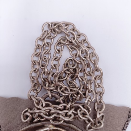 449 - A Kronox silver and uncut amethyst crystal pendant, on a chain, with a branded bag