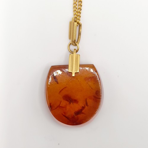450 - An 18ct gold and amber pendant, on a 18ct gold chain, the chain approx. 6.6 g