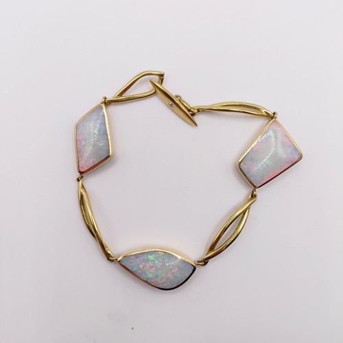 459 - An 18ct gold and opal bracelet, 19.3 g all in