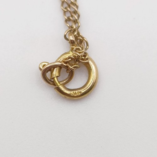 518 - A 9ct gold cross pendant, and two 9ct gold chains, 3.3 g