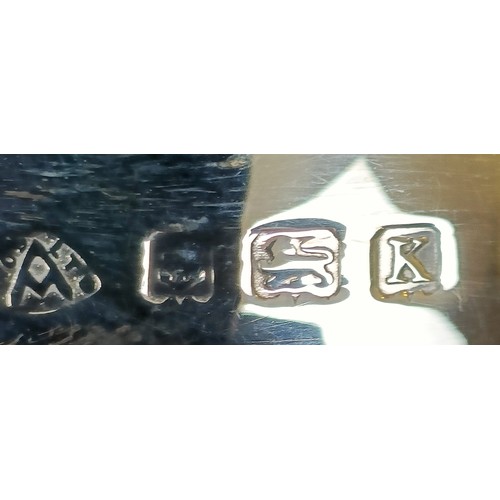 36 - A silver sugar bowl, a serving spoon, and two butter knives, 4.2 ozt