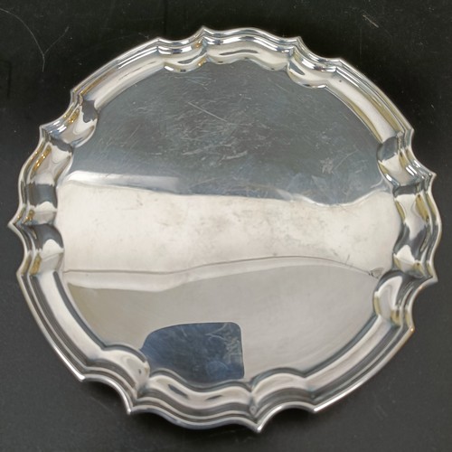 37 - An 18th century style silver waiter, Sheffield 1986, 5.5 ozt, 15.5 cm diameter