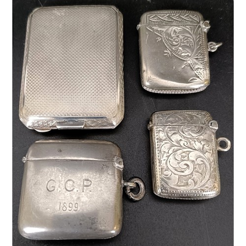 47 - A George V silver matchbox holder, two silver vestas, 2 ozt, and a silver plated vesta (4)