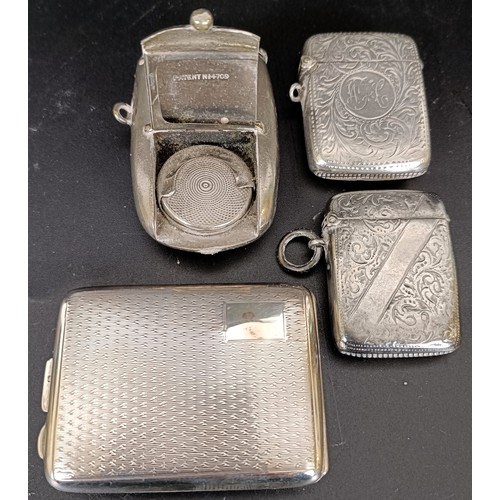 49 - A George V silver matchbox holder, two silver vestas, 2.4 ozt, and a silver plated vesta/sovereign h... 