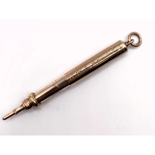 404 - A 9ct gold extending pencil, 12 g all in